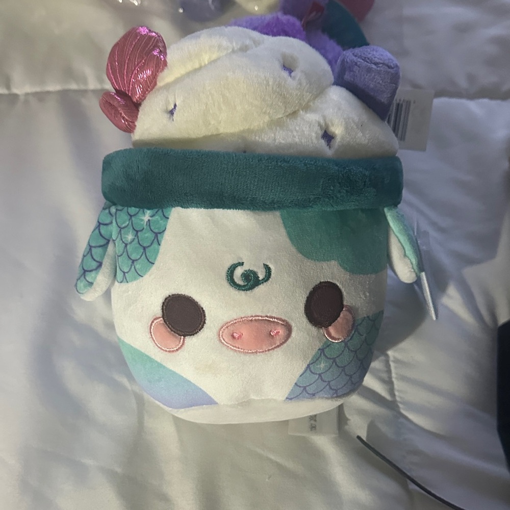 Plush Stuffed Animal with Teal and Pink Accents